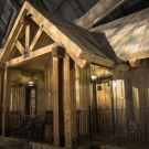 Inner Atrium - Duck Lodge outer trusses, balcony and cabin design.