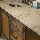 Spa Center. Floor to ceiling pecky cypress on all interior walls. Custom vanity and work area.