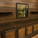 Spa Center. Floor to ceiling pecky cypress on all interior walls. Custom wall to wall cabinetry made from pecky cypress and cedar. Floating shelves.
