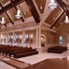View of left wing and seating. CeilingCeiling beams, columns, stairs, display arches and molding.