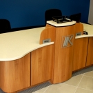 Shorter version of the "Butterfly" Corian top reception desk.