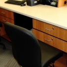 Reverse view of "Butterfly" Corian top reception desk.
